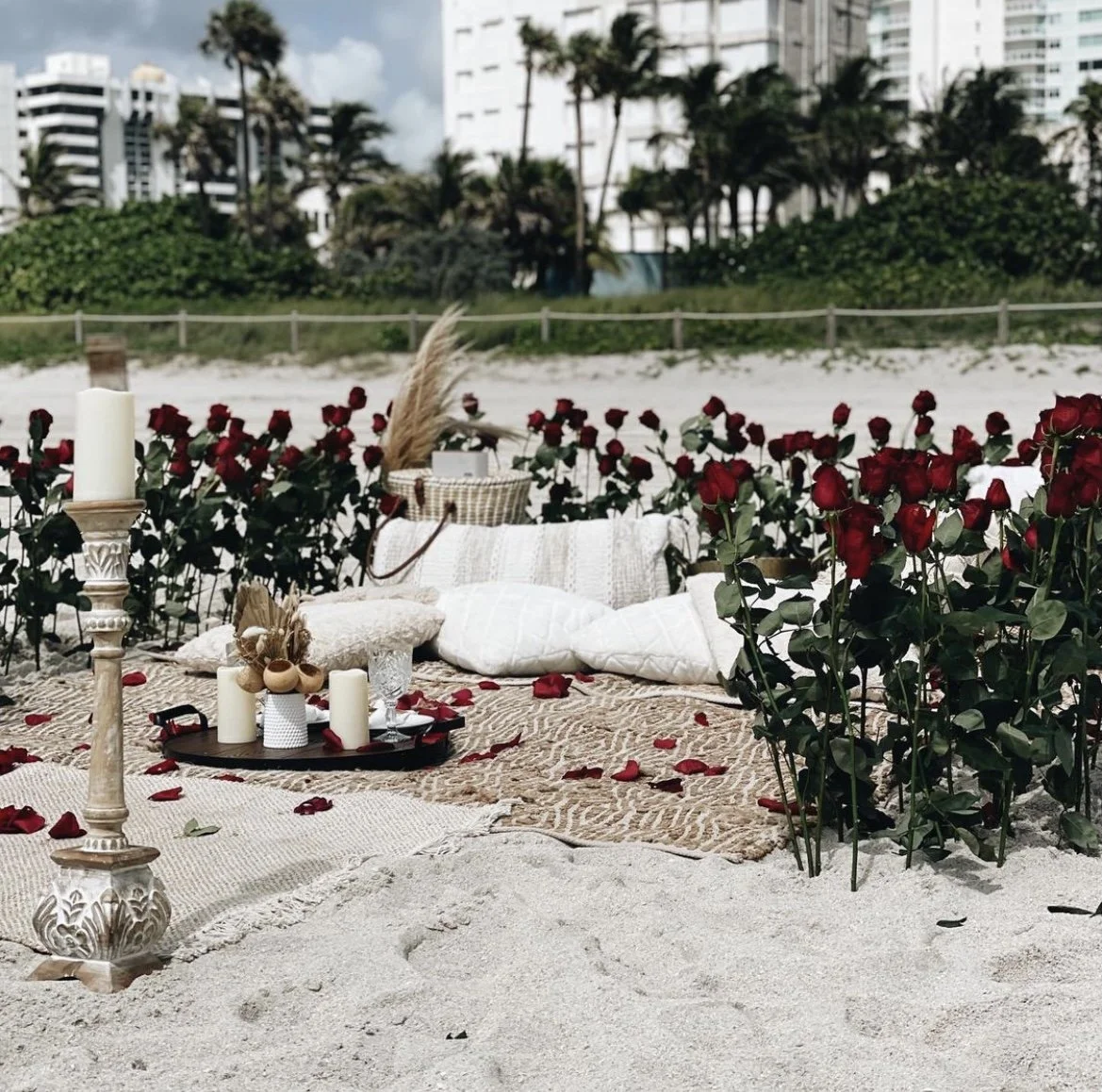 Romantic beach proposal setup Miami luxury picnic